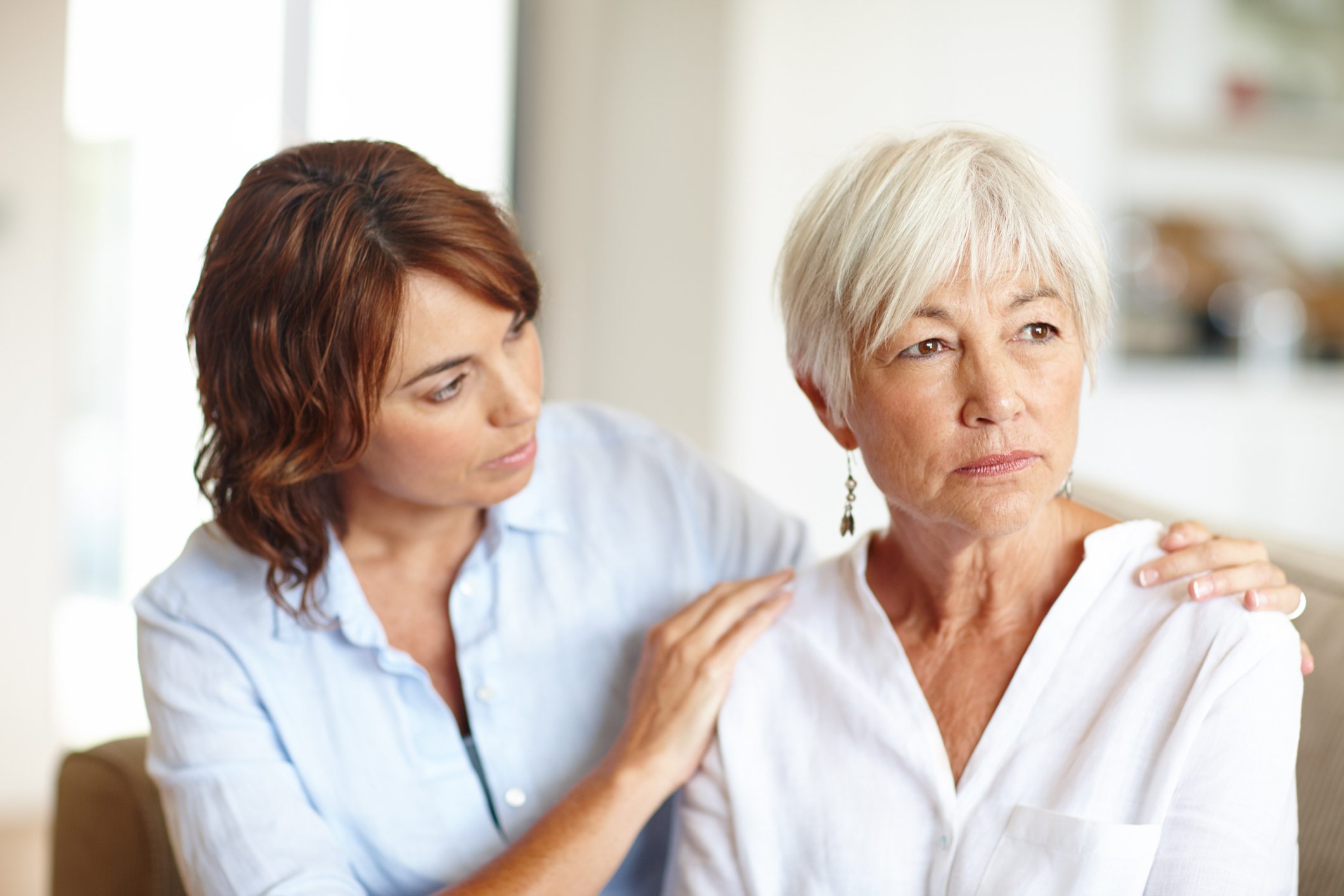 Woman helping loved one reduce depression and anxiety through active care